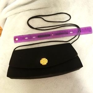 Black clutch with gold  snap